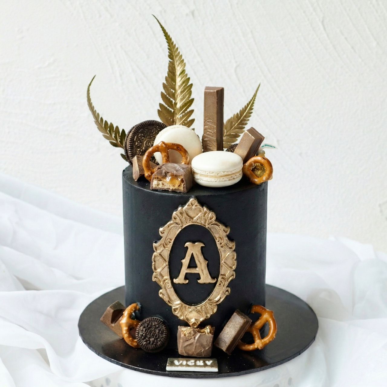 Black Gold Initial Cake